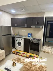  21 For rent in Ajman, studio in Al Yasmeen Towers, opposite Ajman City Centre, new furniture, easy exit