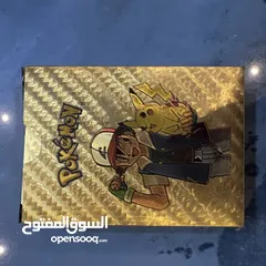  14 كروت بوكيمون والبومات (Pokemon cards and binders)