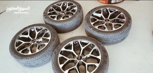  2 GMC rim with tyres