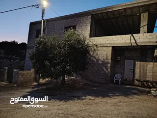  1 ارض للبيع 4300م على القوشان وعلى الواقع 12دونم متواجد بيت مساحة 380 متر طابقين +خزان يتسع50 متر