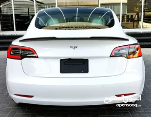  6 تيسلا 2021 model 3 فحص كامل 4 جـيـد فرش ابيض جنط 19بحالة الوكالة لون مميز للبيع بسعر لقطة ومحروووق
