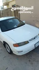  1 كيا سيفيا لون ابيض دهان جيد