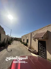  7 شاليه مع مزرعه مميز للبيع منطقة القنيه