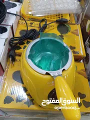  11 مكبس  بسكويت الوافل  و طنجرة تذويب شوكلاته او اعداد الخليط