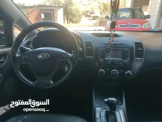  16 كيا سيراتو موديل 2014 ما شاء الله فول اضافات فتحة سقف حساس امامي خلفي شركة ليد امامي وخلفي سبويلرات