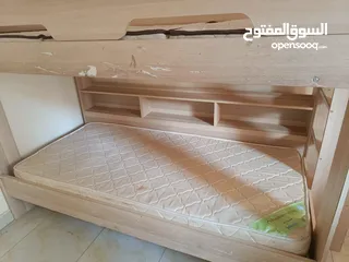  1 Baby bunk bed which mattress