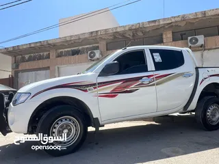  2 l200 موديل  2009 فحص كامل مالك ثاني من الحره ماشيه 226 الف