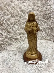  8 تماثيل خشب زيتون نحت يدوي احجام وأوزان مختلفة