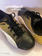  6 Unisex Puma kids football shoes (yellow) -  حذاء اطفال لون اصفر لكرة القدم (صالح للجنسين)