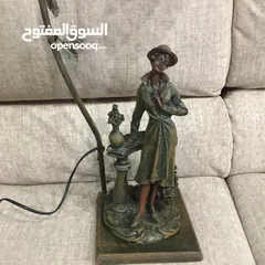  3 تمثال برونزي مع شمعدان فضة