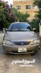  4 كيا سبكترا 2004