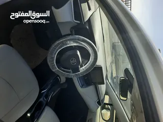  9 تويوتا كورولا وارد أمريكي بطاريه ليثيوم موديل 2021 لون ابيض