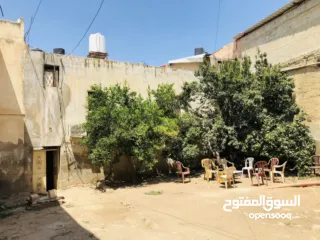  1 بيع محلات ومنزل