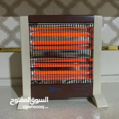  1 هيتر كهربائي 4 شمعات