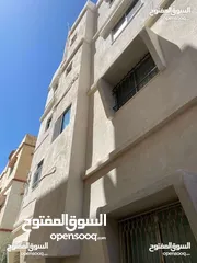  1 عماره للبيع 4 طوابق الزرقاء الجديدة مقابل صالة قصاد