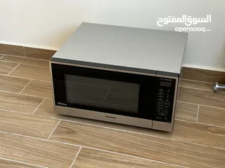  1 مايكروويڤ باناسونيك فري ستاند اكبر حجم بحالة ممتازه جميل جداً 44 لتر