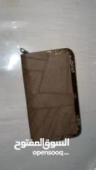  1 محفظة نسائية