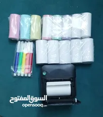  1 طابعة ستيكرات مع رولات تربط على التلفون