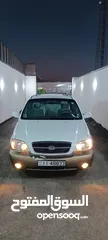  2 كيا 2004 عائليه 9 ركاب للبيع او البدل