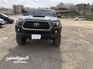  6 تويوتا تاكوما 2017  كابينة و نص مميز غيار عادي 4x4   بحالة ممتازة من المالك.