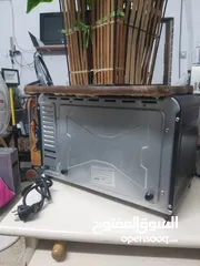  4 فرن كهربائي لتسخين والشوي