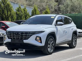  2 هونداي توسان 2022  فل اضافات بدون فتحة سقف  فحص نخب  عداد 22 الف كيلو  الجب كرتونة