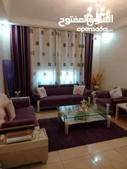  2 طقم كنب +طاولة سفرة خشب ثمانية مقاعد