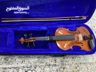  1 الة موسيقية (كمان)