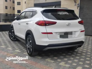  7 هونداي توسان بنزين فل مسكر اضافات دفع رباعي جيب بالكرتونة قطارة بالمصروف