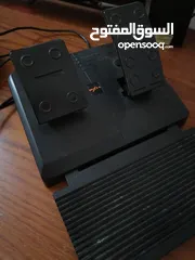  3 a pxn simulator pack with a steering wheel and a pedals with a gear shifter