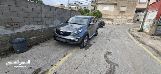  12 جيب كاياسبورتاج موديل 2014-اتومتيك'دفع 4×4 ماتور 2000ديزل فل فل اضافات ماعد الفتحة - نظيف من الاخر