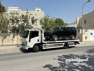  22 سطحة مدينة حمد 24  Hamad Town TOWING CAR 24  ونش  رافعة  رافعه  نقل  سطحة البحرين خدمات  سحب  سيارات