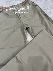  1 بنطلون كتان وسبورت جديد. لون زيتي. حجم سمول. مناسب لكل الفصول والأجواء