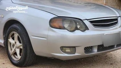  12 للبيع  كيا سبكترا 2002 - نظافة مميزة وسعر ممتاز سيارة اقتصادية ومريحة