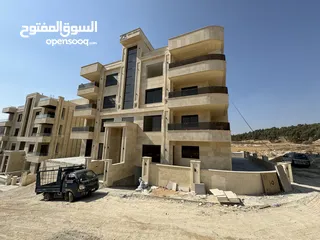  23 شقة دوبليكس مع روف للبيع في مرج الحمام خلف مدارس العالمية - الحويطي