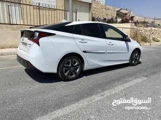  1 تويوتا بريوس 2022  بطاريه ليثيوم ماشيه 10 الاف 4 جيد حره جمرك جديد باسم المشتري