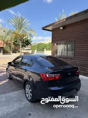 2 بالورقة كيا برايد 2014 اتوماتيك لون بترولي مميز فل اضافات فقط 44 الف كاش صالون فحص نخب سيارة لعبة