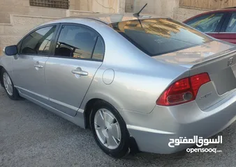  12 هوندا سيفيك هايبرد 2007 دهان وكالة جديد بتمشي 350 كيلو بالتنكة.