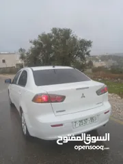  5 ميتسوبيشي لانسر. 2015 اصل برايفت   رخصة وتامين  ماطور 1600 اتومات  شامل  فتحة