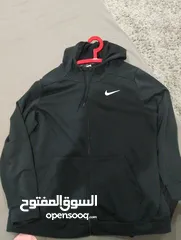  1 new Nike zip up hoodie