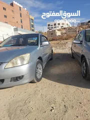  13 لانسر 2005 وارد الكويت 4 جيد ماتور 1600 الاصلي "الملا"