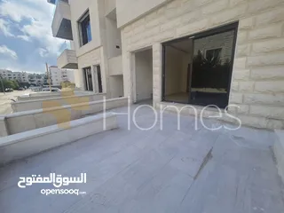  2 شقة ارضية مع ترس للبيع في حي الصحابة بمساحة بناء 180م
