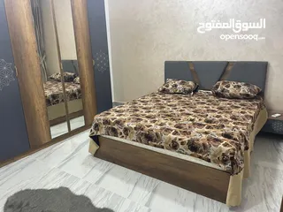  2 شقة مفروشة مودرن علي حمام سباحه قرب النيل بالدقي