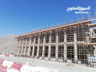  2 محل تجاري عظم للبيع في مخيم عين السلطان على الشارع الرئيسي