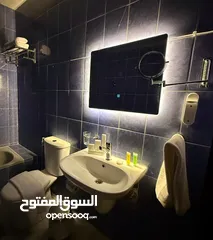 12 شقق واستديوهات فندقيه وشقق سكنيه للايجار بموقع مميز بين الجاردنز وتلاع العلي بخدمتكم على مدار الساعه