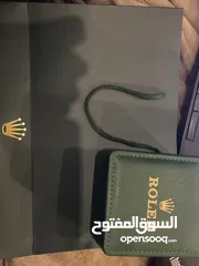  2 ساعة رولكس كوبي ماستر مختومه لون مميز عقارب وتاريخ مع علبتها وكيس رولكس
