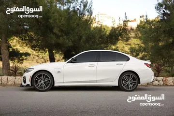  24 BMW 330e XDrive 2022 M kit للبيع كاش او اقساط