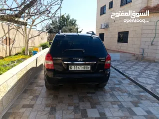  1 جيب توسان  لون  أسود فتحة سقف 4*4