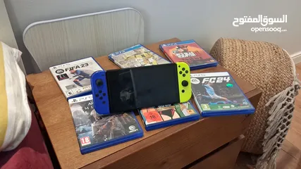  1 نينتيندو سويتش اوليد مع العاب و العاب بلايستيشن 4 و 5