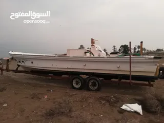  5 قارب مسطح 33 قدم مصنع وادي حام كلباء 2017 القارب فيه محياة للسمك الحي 2 واحد كبير فوق وثلاجة السطحة